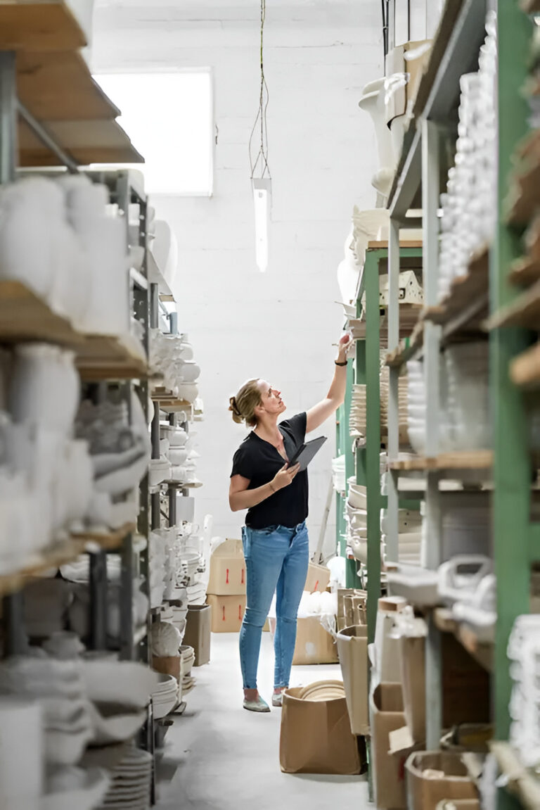 Shelves of packaged stock in an ecommerce warehouse ready for online orders